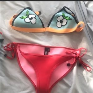 Used floral triangl bikini with bag